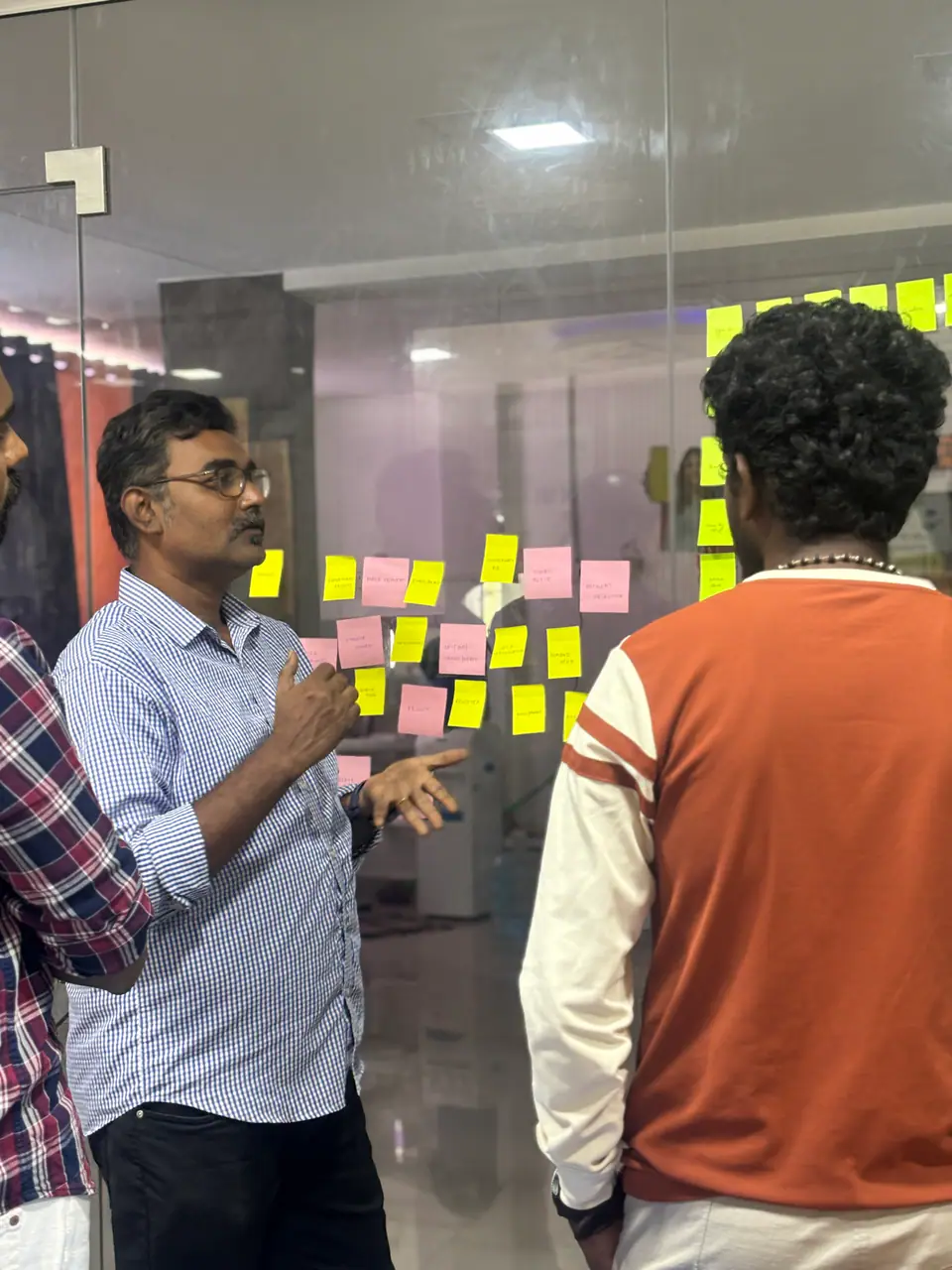 Design learners presenting work during class