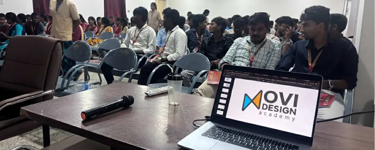 College students at a UX UI design seminar with the Ovi Design Academy presentation on a laptop